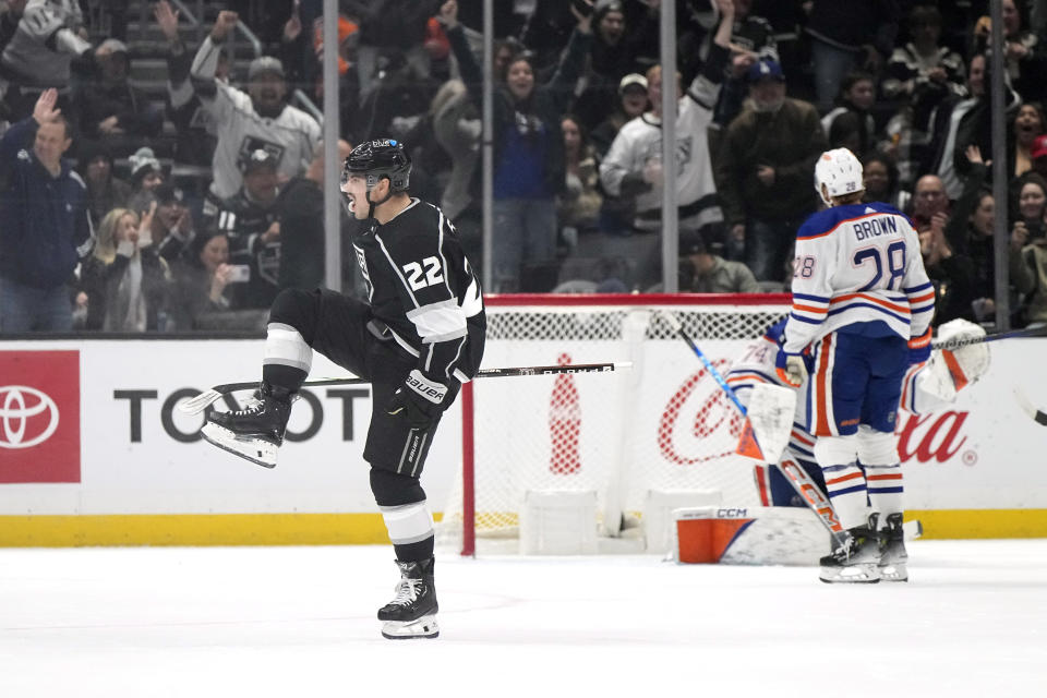 Los Angeles Kings left wing Kevin Fiala, left, celebrates his goal as Edmonton Oilers right wing Connor Brown, right, and goaltender Stuart Skinner stand by the goal during the first period of an NHL hockey game Saturday, Dec. 30, 2023, in Los Angeles. (AP Photo/Mark J. Terrill)