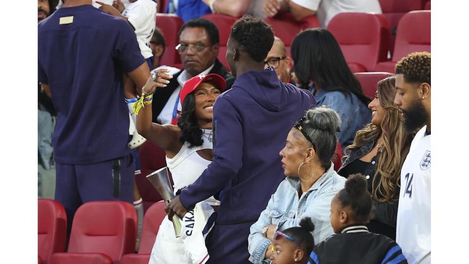 The pair looked smitten as they shared an embrace following England's win against Switzerland 