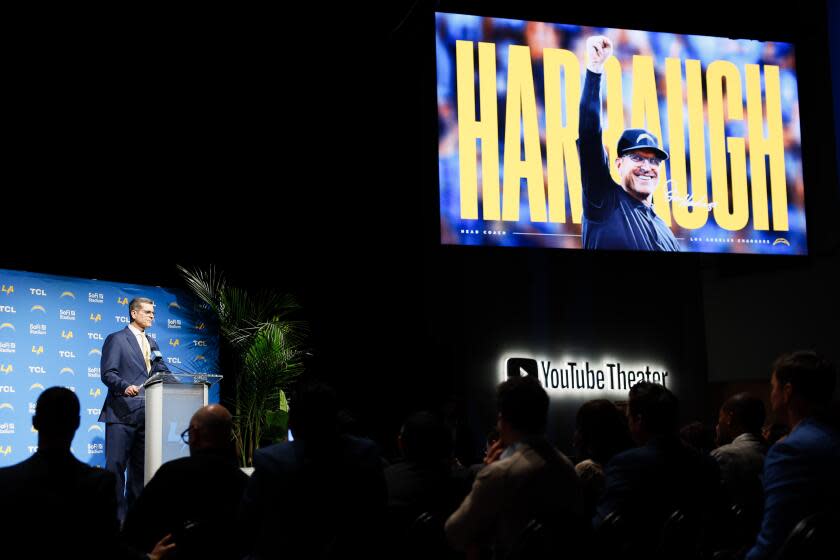 The video board boasted new Chargers coach Jim Harbaugh.