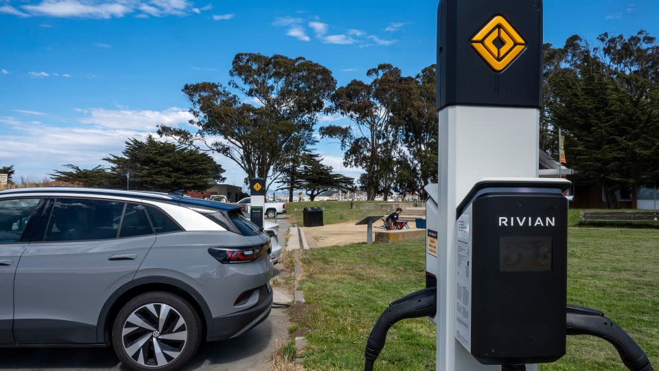 An EV at a Rivian charging station in San Francisco. Newsome told CNN California would continue to lead on clean energy, no matter who wins the election. - David Paul Morris/Bloomberg/Getty Images