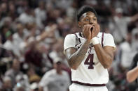 Texas A&M guard Wade Taylor IV (4) reacts after getting called for a foul against Alabama during the first half of an NCAA college basketball game Saturday, March 4, 2023, in College Station, Texas. (AP Photo/Sam Craft)