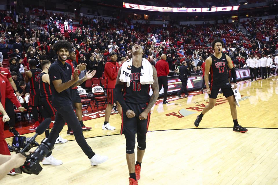 UNLV guard Keshon Gilbert (10) celebrates the team's win over Dayton in an NCAA college basketball game Tuesday, Nov. 15, 2022, in Las Vegas. (AP Photo/Chase Stevens)