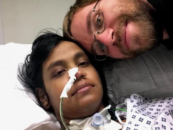 Ms Esapathi and her fiance Mr Mangler following her major surgery in September