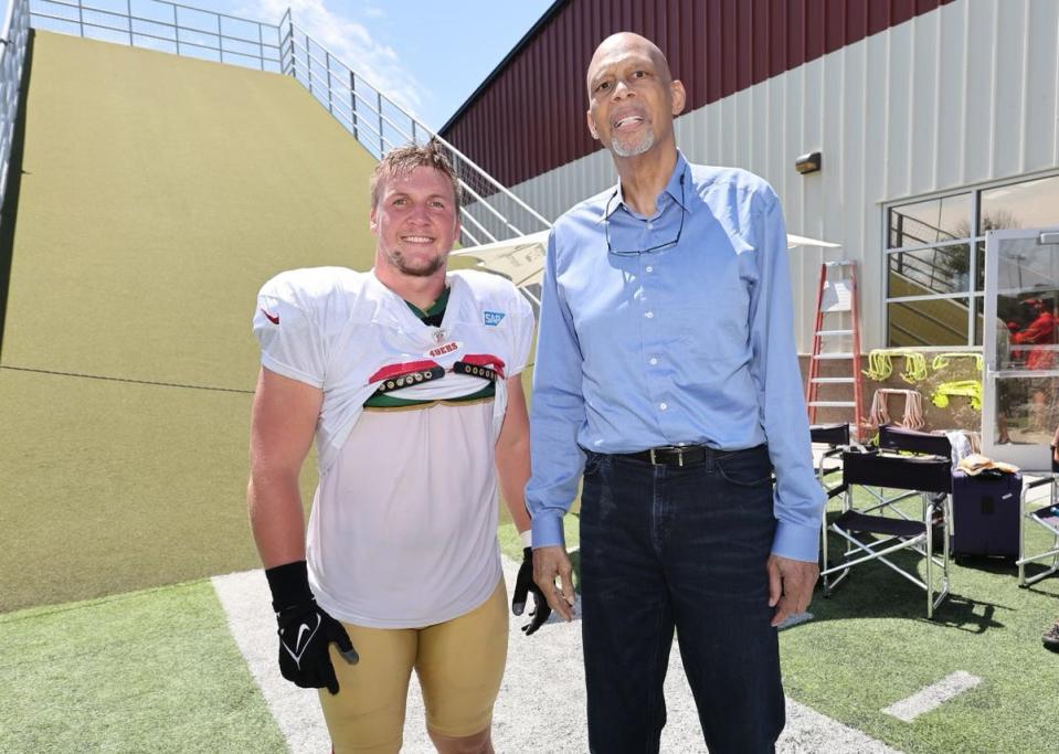 Spencer Waege, a 2017 Watertown High School graduate, is pictured next to legendary basketball player Kareem Abdul-Jabbar during the San Francisco 49ers training camp in August of 2023 at Santa Clara, Calif.