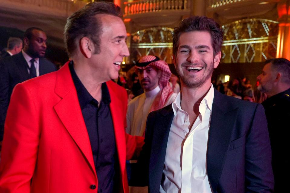 Nicolas Cage and Andrew Garfield at the closing ceremony of RSFF (Red Sea Film Festival/AFP via Getty)