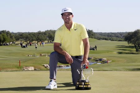 Apr 23, 2017; San Antonio, TX, USA; Kevin Chappell poses with the championship trophy after winning the Valero Texas Open golf tournament at TPC San Antonio - AT&T Oaks Course. Mandatory Credit: Soobum Im-USA TODAY Sports