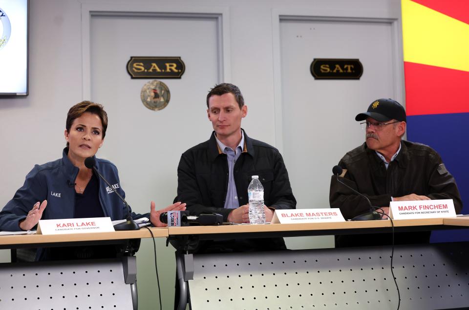 (L-R) Arizona Republican Gubernatorial candidate Kari Lake, Arizona Republican Senate candidate Blake Masters and Secretary of State candidate Mark Finchem participate in a border security roundtable with law enforcement officials at the Cochise County Sheriffs' Office on Nov. 4, 2022, in Sierra Vista, Arizona. Lake is visiting the southern border region to outline her plan for border security.