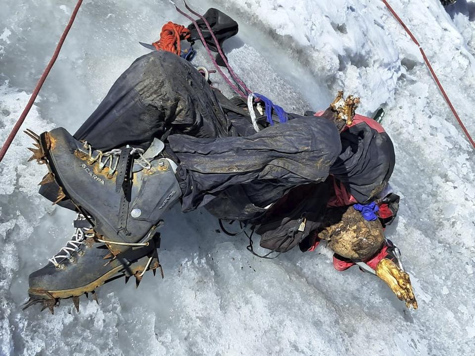 This photo distributed by the Peruvian National Police shows the remains of who police identify as U.S. mountain climber William Stampfl, on Huascaran mountain in Huaraz, Peru, July 5, 2024. Peruvian authorities announced on Tuesday, July 9, 2024, that they have found the mummified body of the American man who died 22 years ago, along with two other American climbers, after the three were trapped in an avalanche while trying to climb Peru's highest mountain. (Peruvian National Police via AP)