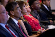 From left, acting DEA Administrator Uttam Dhillon, First lady Melania Trump, and Mika Camarena, the wife of former DEA agent Kiki Camarena who was killed in 1985 while on assignment in Mexico attend a Red Ribbon Rally at the Drug Enforcement Agency in Arlington, Va., Monday, Oct. 7, 2019.(AP Photo/Andrew Harnik)