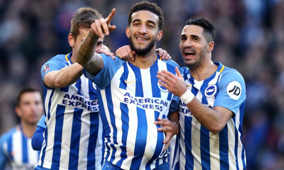 Connor Goldson celebrates scoring Brighton’s second goal against Coventry with Beram Kayal.