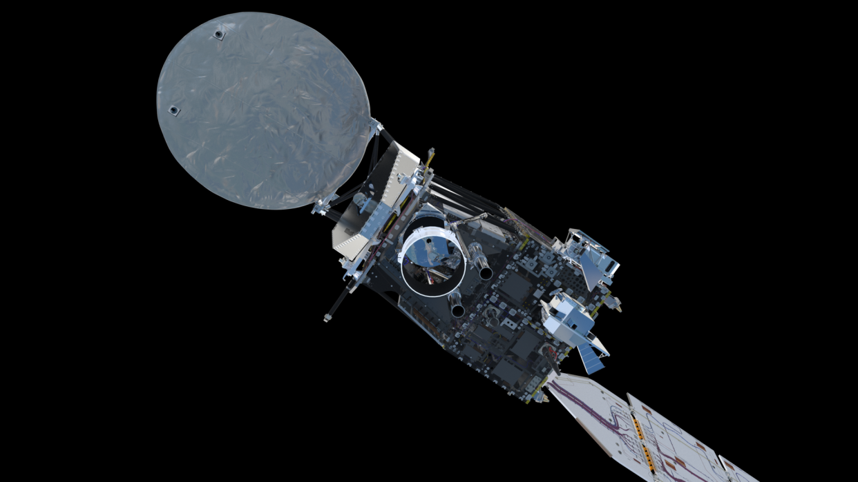  A spacecraft is seen with a metal box like shape in the middle and a white disk-like shape toward the left. 