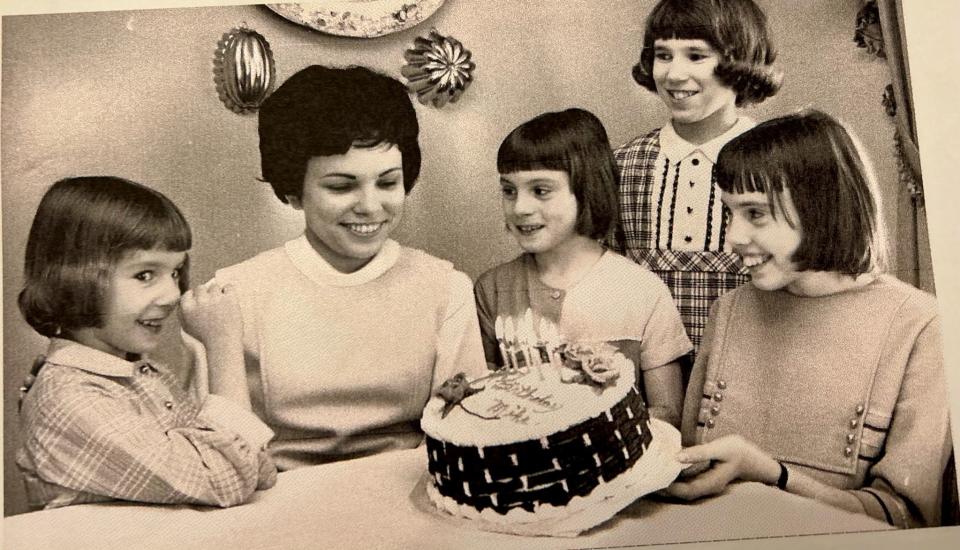 In 1968, The Canton Repository took this photo of Michalene Saunier, then 28, celebrating her 7th leap year birthday with her children.