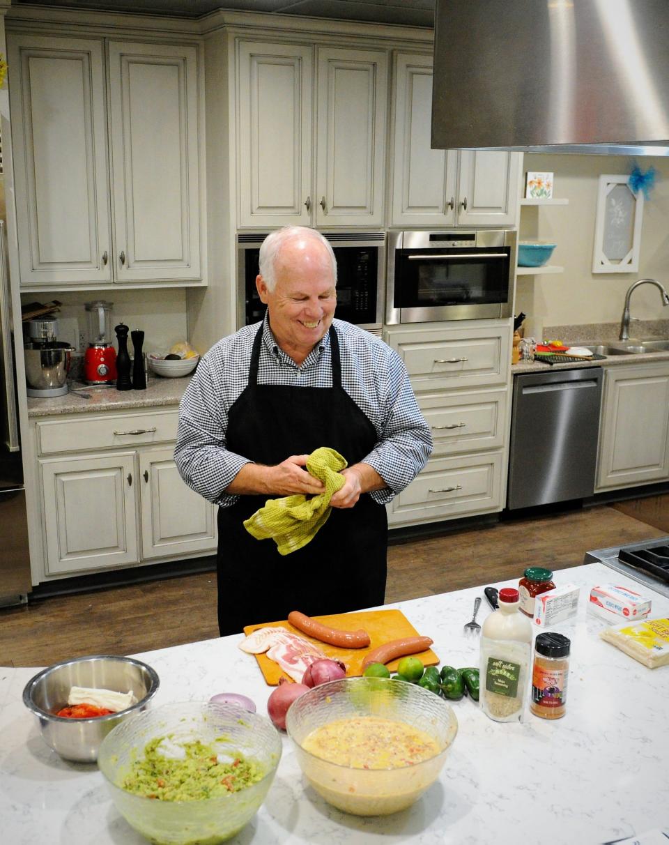 Grand Champion Pitmaster Jim Johnson prepares to teach a class on Superbowl appetizers at Thyme in the Kitchen in Evansville on Wednesday, Feb. 1, 2023.