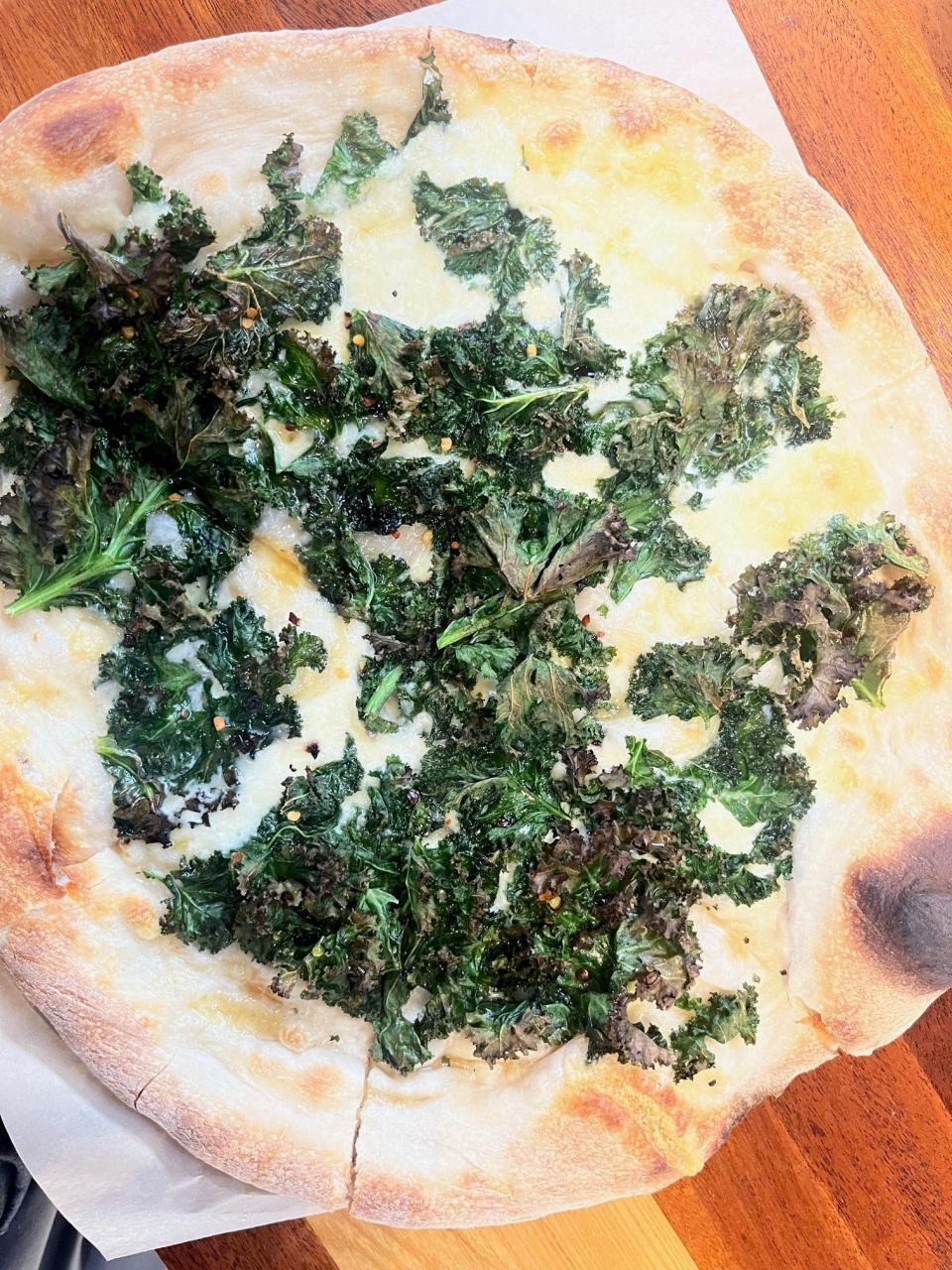 Northstar's Burrata and Crispy Kale Brick Oven Pizza includes fontina cheese and burrata, oven-crisped kale and a drizzle of hot honey.