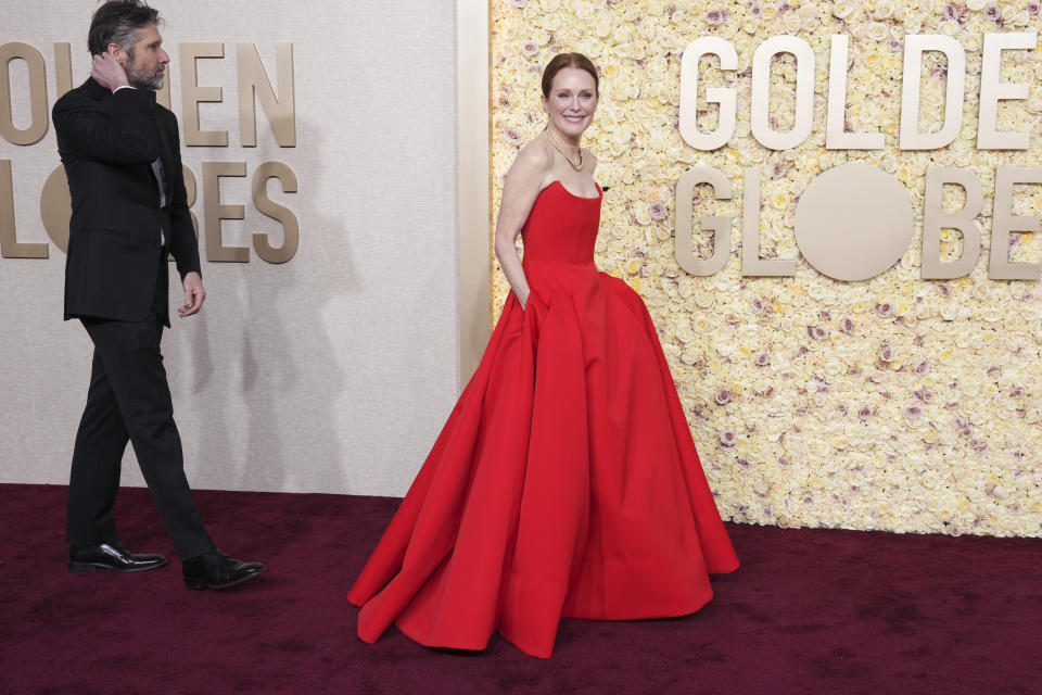 CORRECTS SPELLING FROM JULIANNA TO JULIANNE - Julianne Moore arrives at the 81st Golden Globe Awards on Sunday, Jan. 7, 2024, at the Beverly Hilton in Beverly Hills, Calif. (Photo by Jordan Strauss/Invision/AP)