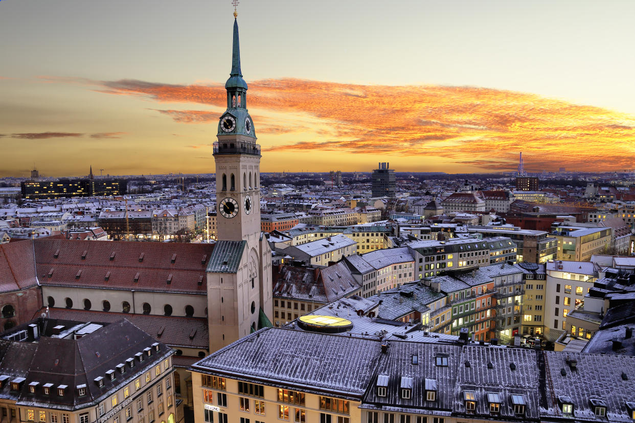 City Centre of Munich with old Town Hall light up taken during sunset. Germany