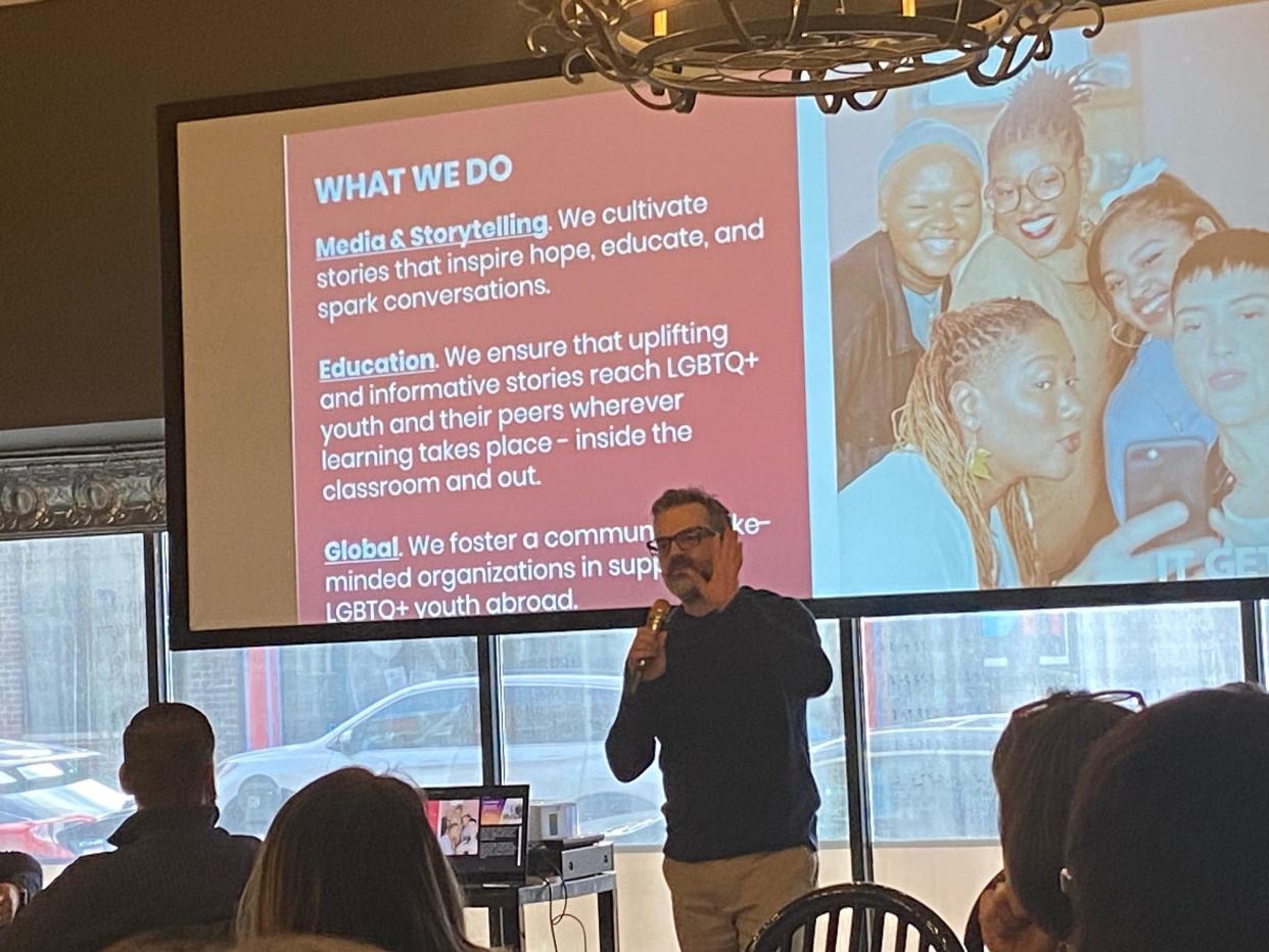 Brian Wenke, the executive director of "It Gets Better Project" and an Ohio native, talks at Gravity Ohio's event Tuesday night at at DLX downtown Mansfield about helping LGBTQ+ youth.