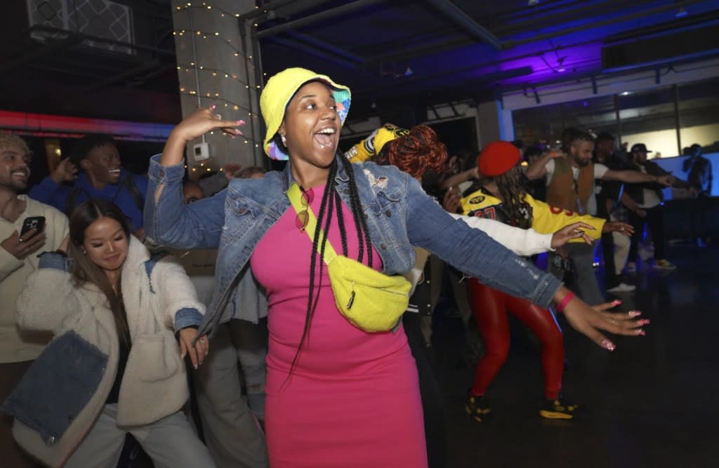 Jade Russell of Louisville, Kentucky, dances at The Cove, a pop-up, 18-and-up Christian nightclub, on Saturday, Feb. 17, 2024, in Nashville, Tenn. (AP Photo/Jessie Wardarski)