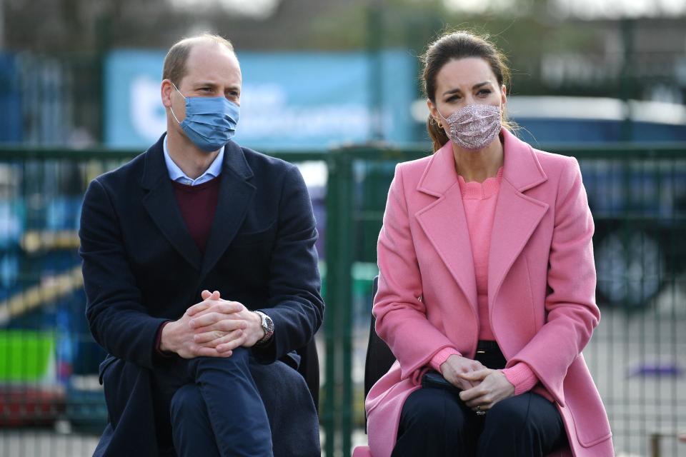 Britain's Prince William, Duke of Cambridge  and Britain's Catherine, Duchess of Cambridge listen during a discussion with teachers and mental health professionals at a visit to School21 following its re-opening after the easing of coronavirus lockdown restrictions in east London on March 11, 2021. - The visit coincides with the roll-out of Mentally Healthy Schools resources for secondary schools and how this is helping put mental health at the heart of their schools curriculum. (Photo by JUSTIN TALLIS / various sources / AFP) (Photo by JUSTIN TALLIS/AFP via Getty Images)