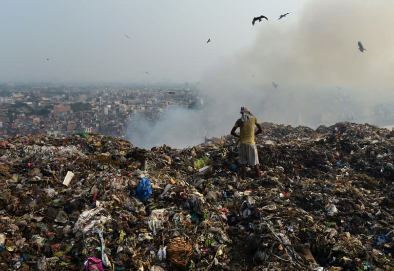 Locals living near the huge Ghazipur landfill in New Delhi site complain of chronic headaches, wheezing and recurring bouts of fevers and colds as methane from decomposing waste escapes the landfill and fills their homes