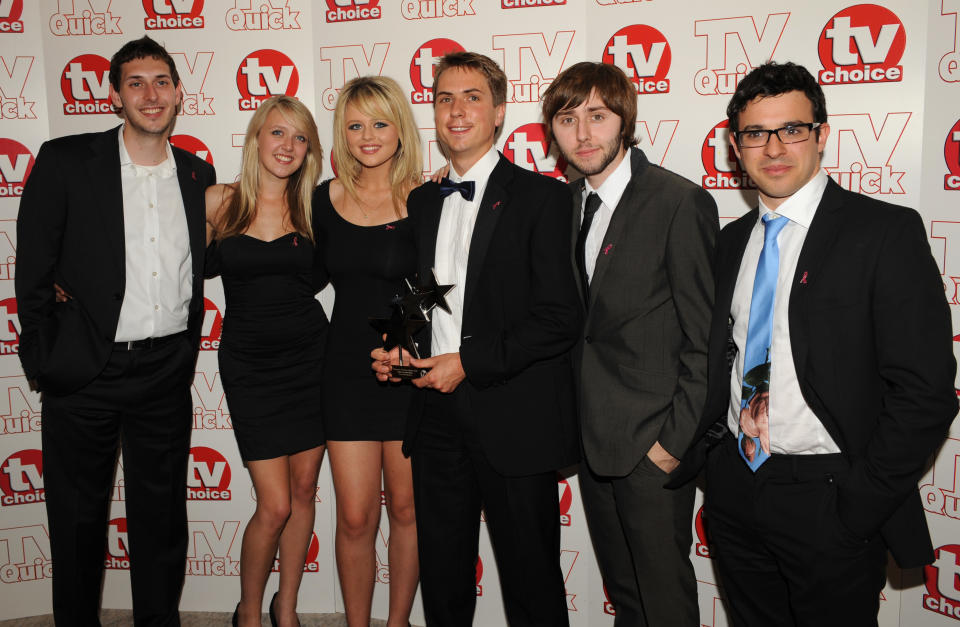 The cast of the Inbetweeners (left to right, Blake Harrison, Emily Head, Emily Atack, Joe Thomas, James Buckley and Simon Bird) with the Best Comedy Show award at the Dorchester Hotel, Park Lane, London