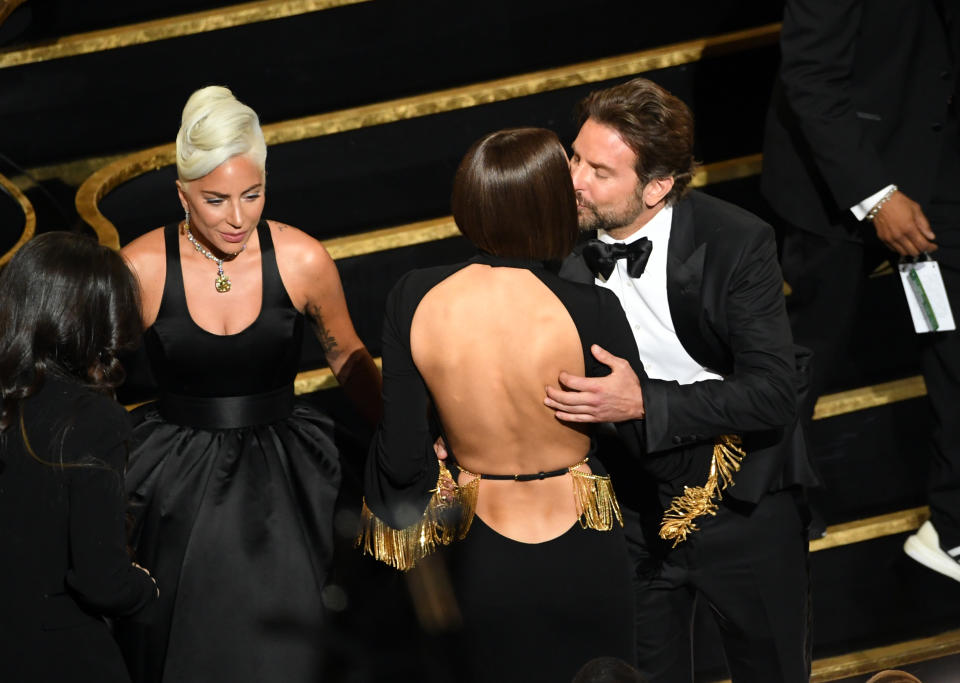 Many assume that the gorgeous model isn’t happy to see Gaga getting so cosy with her man in front of the world. Photo: Getty Images