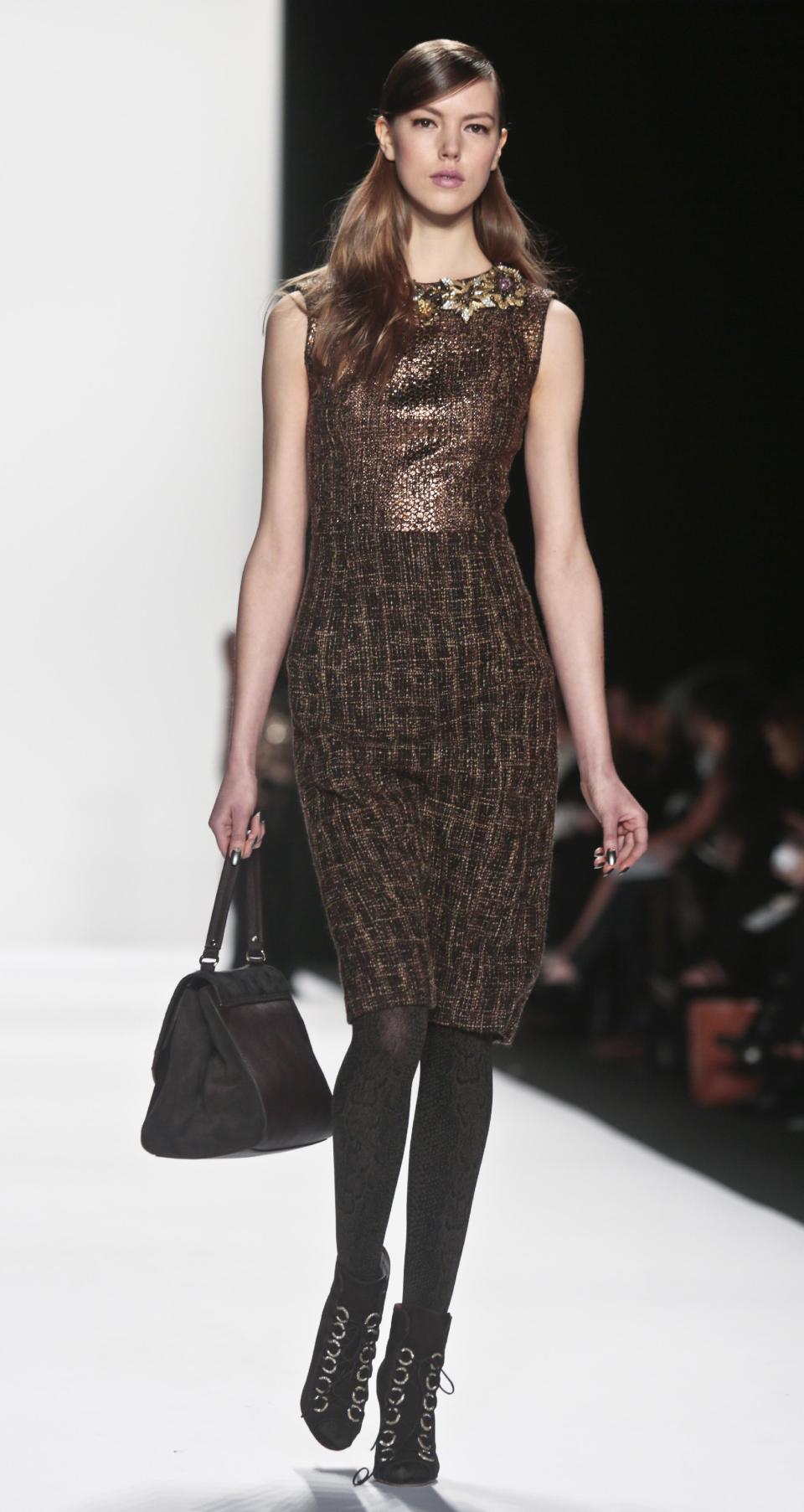 Fashion from the Badgley Mischka Fall 2014 collection is modeled during New York Fashion Week on Tuesday Feb. 11, 2014. (AP Photo/Bebeto Matthews)