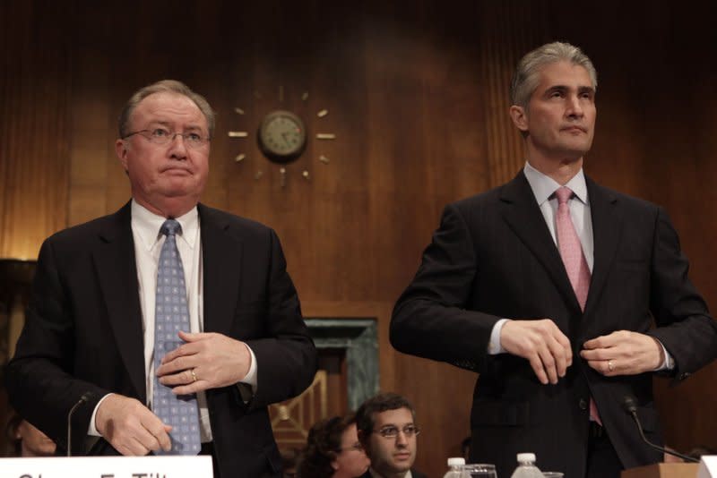 Glenn Tilton (L), president and CEO of United Airlines, and Jeffery Smisek, president and CEO of Continental Airlines, arrive to testify before the Senate Antitrust, Competition Policy and Consumer Rights Subcommittee hearing on The United/Continental Airlines Merger on Capitol Hill in Washington on May 27, 2010. On August 27, 2010, the planned $3 billion merger of Continental and United Airlines was approved by the U.S. Justice Department, clearing the major regulatory hurdle to the creation of the world's biggest airline. File Photo by Yuri Gripas/UPI