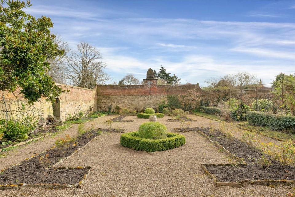 Kings Newton Hall has a formal walled garden (Fisher German)