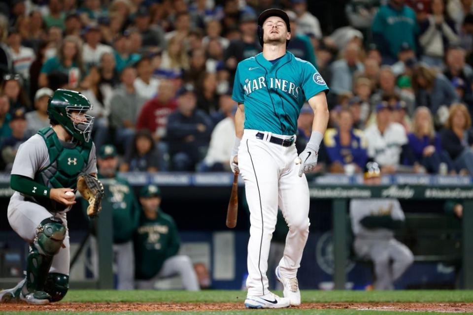 SEATTLE, WASHINGTON - SEPTEMBER 30: Jarred Kelenic #10 of the Seattle Mariners reacts after striking out during the fourth inning against the Oakland Athletics at T-Mobile Park on September 30, 2022 in Seattle, Washington. (Photo by Steph Chambers/Getty Images)