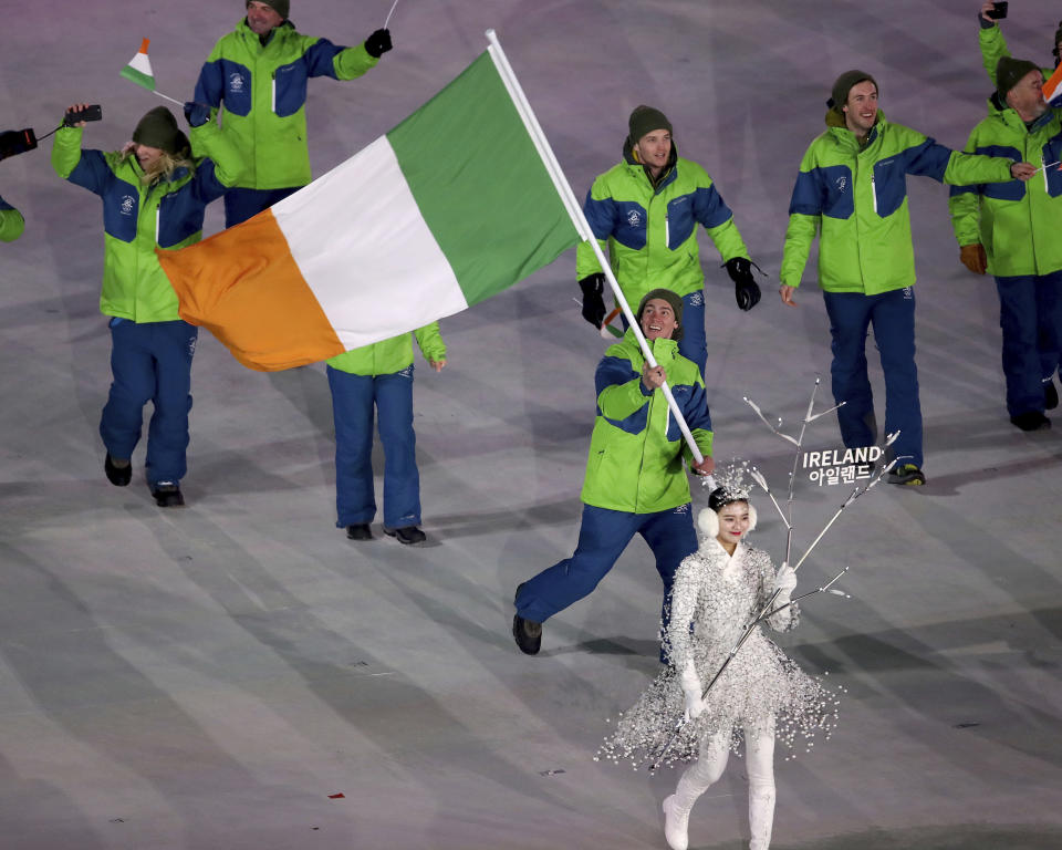 <p>Seamus O’Connor carries the flag of Ireland during the opening ceremony of the 2018 Winter Olympics in Pyeongchang, South Korea, Friday, Feb. 9, 2018. (Sean Haffey/Pool Photo via AP) </p>