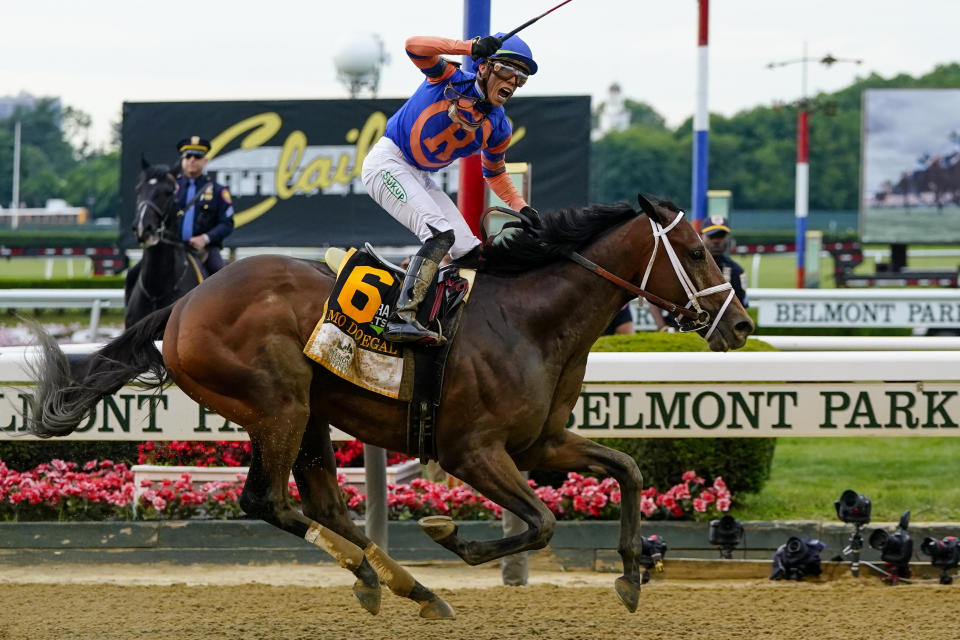 Mo Donegal (6), with jockey Irad Ortiz Jr. up, crosses the finish line to win the 154th running of the Belmont Stakes horse race, Saturday, June 11, 2022, at Belmont Park in Elmont, N.Y. (AP Photo/Frank Franklin II)