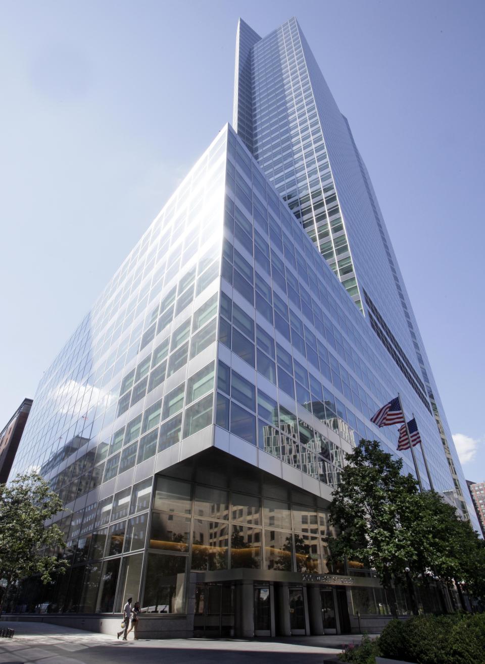 FILE - In this Wednesday, June 29, 2011, file photo is the headquarters building of Goldman Sachs, in New York. Wall Street's big investment banks are sending a message to their employees this summer: Get back into the office, and bring your vaccination card. Goldman Sachs required most of its employees to return to the office on June 14, 2021, with some exceptions extending that deadline to Sept. 30. It requires every employee to state their vaccine status, but does not require proof. (AP Photo/Richard Drew, File)