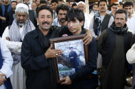 <p>Afghan people gather to stage a demonstration against Afghan Government due to increasing security issues as they carry photographs those who lost their lives on Tuesday evening after an assault to a mosque, in Herat, Afghanistan on August 02, 2017. (Photo by Mir Ahmad Firooz/Anadolu Agency/Getty Images) </p>