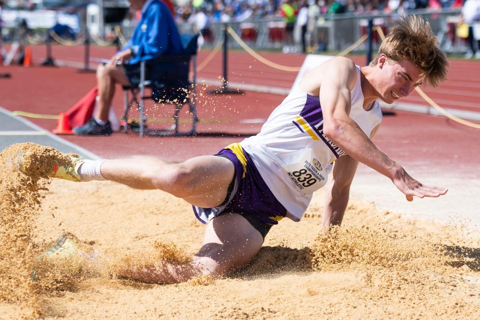 Palisades' Lucas Bottelier lands in the sand as he competes in the 2A long jump at the PIAA Track and Field Championships at Shippensburg University Friday, May 26, 2023.