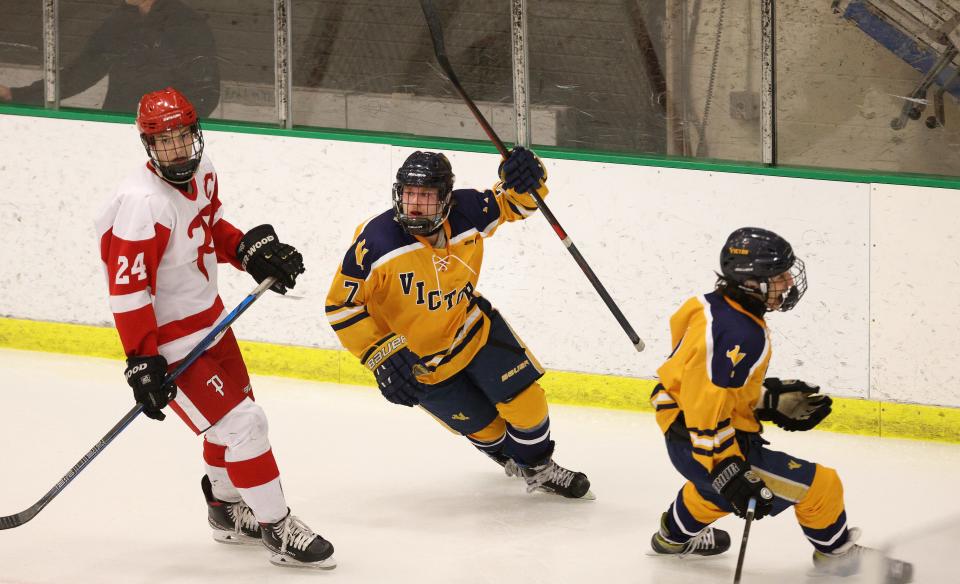 Victor's Colin McNamara celebrates one of his two goals against Penfield in the Class A final.