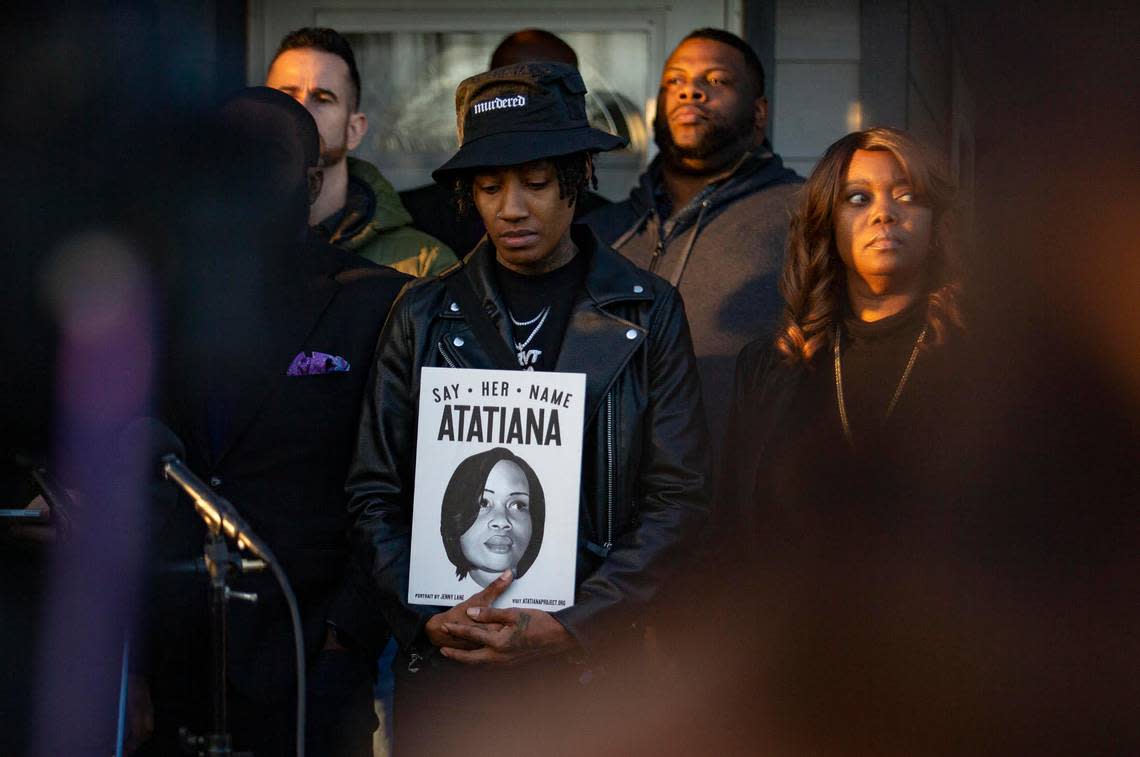 Ashley Carr, Atatiana Jefferson’s sister, holds a press conference at their mother’s house in Fort Worth on Tuesday, Dec. 20, 2022, after former Fort Worth police officer Aaron Dean was sentenced in Jefferson’s death. With her is their attorney Lee Merritt, Fort Worth Councilman Chris Nettles and community activists and friends, some holding signs in memory of Jefferson.