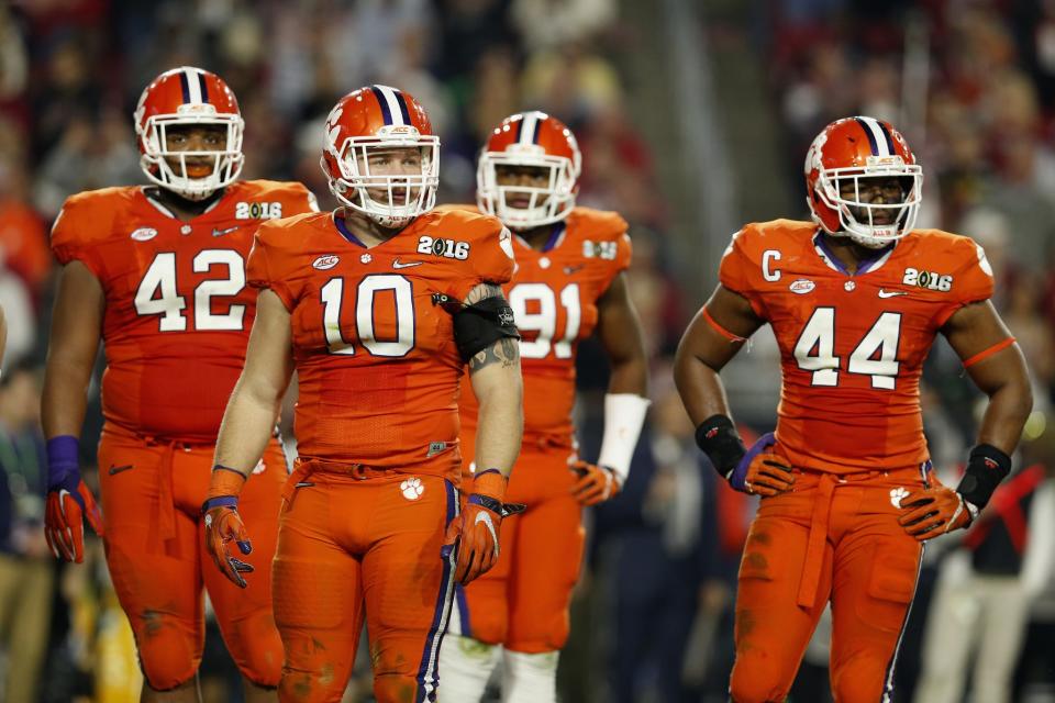 Ben Boulware (10) defended what Christian Wilkins (42) did vs. Ohio State. (Getty)