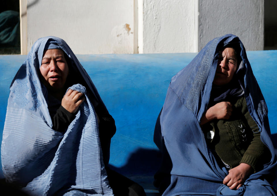 <p>Afghan women mourn inside a hospital compound after a suicide attack in Kabul, Afghanistan, Dec. 28, 2017. (Photo: Mohammad Ismail/Reuters) </p>