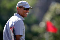 <p>President Barack Obama smiles while golfing Wednesday, Aug. 12, 2015, at Farm Neck Golf Club in Oak Bluffs, Mass., on the island of Martha’s Vineyard. The president, first lady Michelle Obama, and daughter Sasha are vacationing on the island. (AP Photo/Steven Senne) </p>