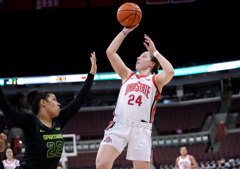 Ohio State guard Taylor Mikesell shoots over Michigan State guard Moira Joiner during the second quarter at Value City Arena in Columbus on Jan. 12, 2022.