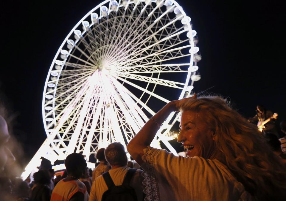 People dance on a beach during the 33rd "Fete de la musique" (music festival) in Marseille