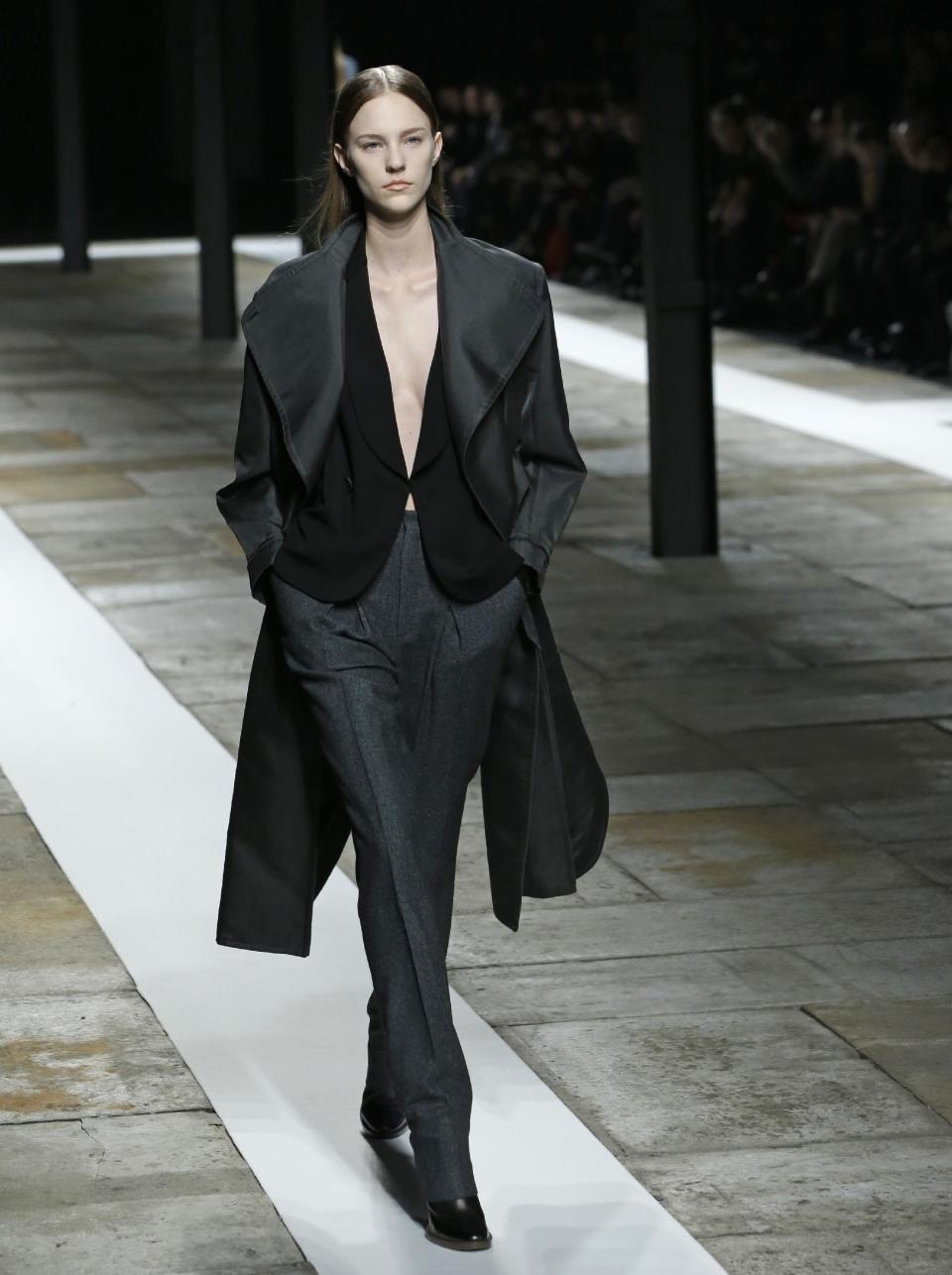 A model walks the runway during the Theyskens Theory Fall 2013 runway show at Fashion Week in New York, Monday, Feb. 11, 2013. (AP Photo/Kathy Willens)