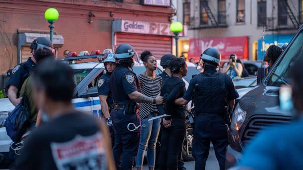 PHOTO: NYPD arrest protesters for breaking the citywide 8:00PM curfew on June 4, 2020 in the Bronx borough of New York City. (David Dee Delgado/Getty Images, FILE)