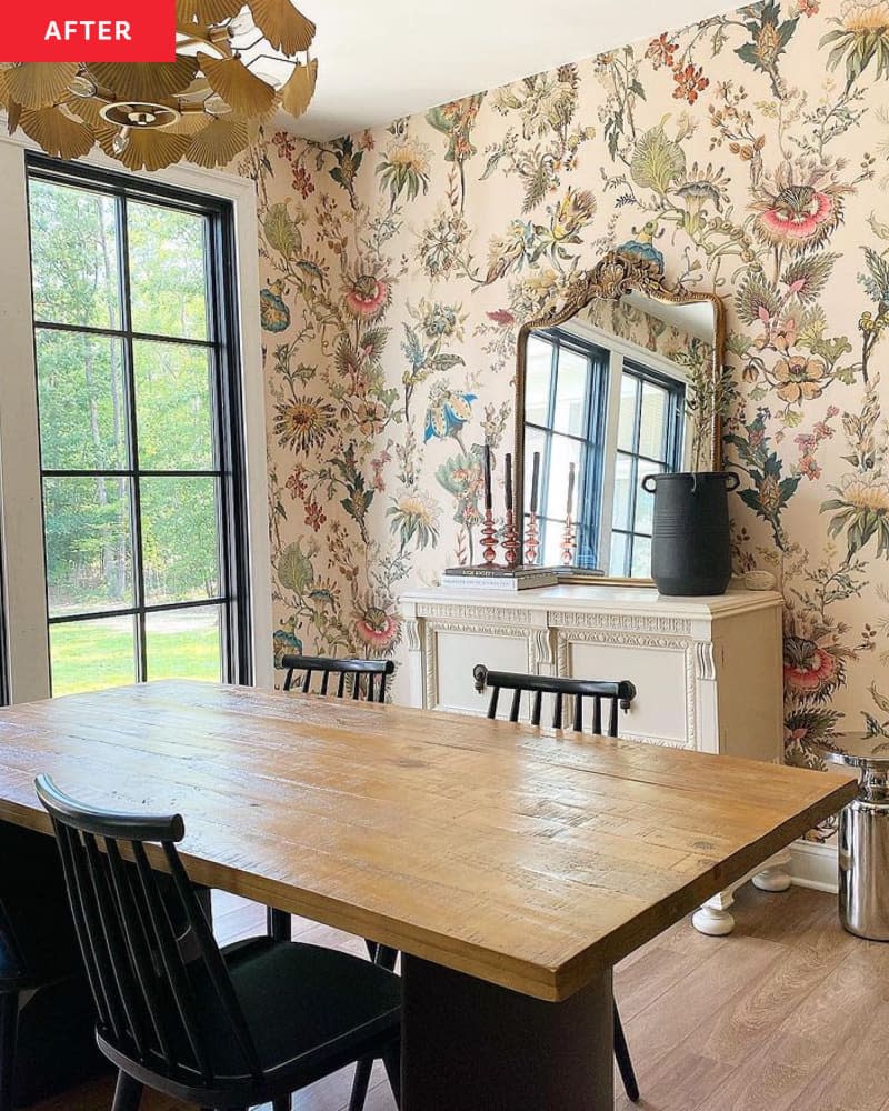 A rectangular dining table in a floral room