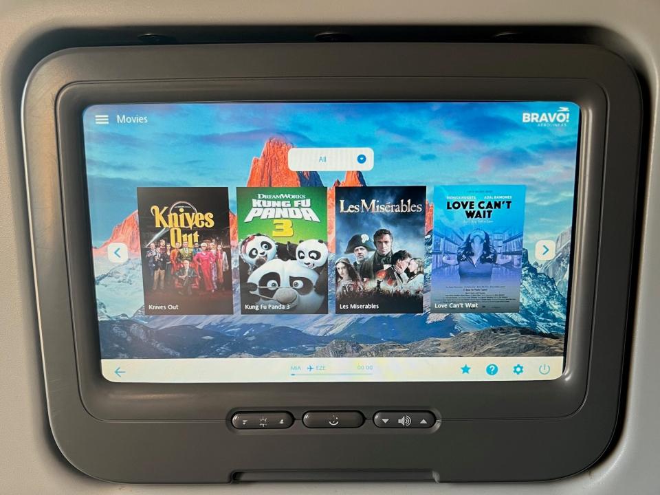 Movie titles showing on my inflight screen, including Knives Out, Kung Fu Panda 3, and Les Miserables.