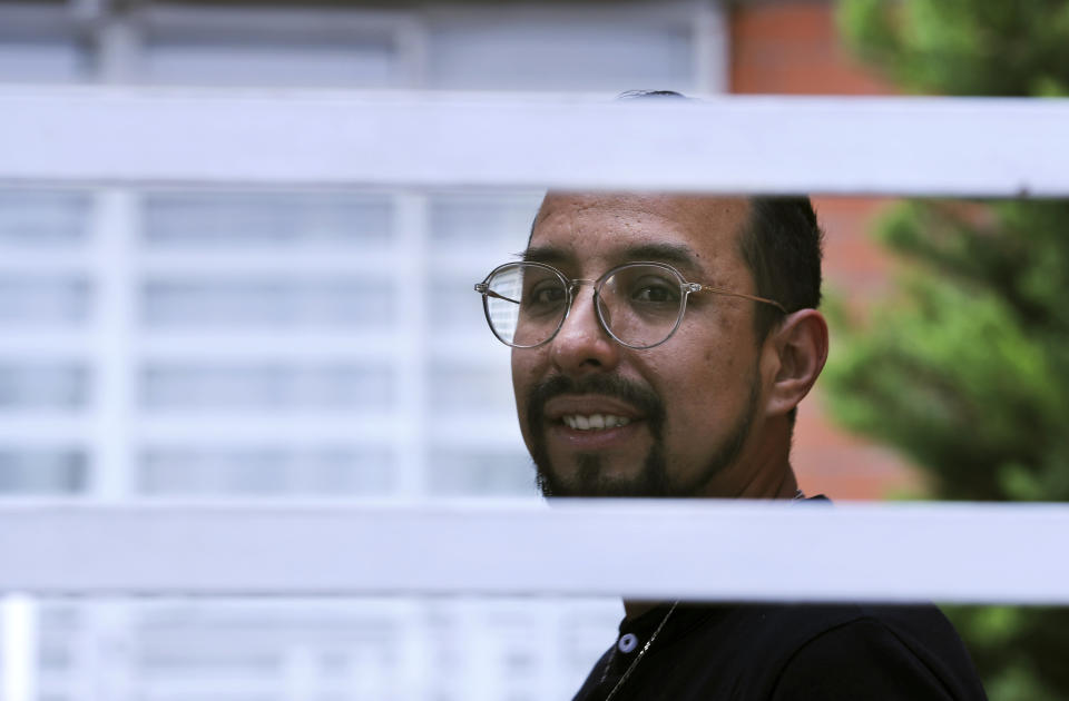 Erik Bravo, 34, a survivor of Monday's subway collapse, poses for a photo in Mexico City, Thursday, May 6, 2021. Bravo is not exaggerating when he says that he could have been one of those who fell and, perhaps, would have lost his life when the overpass of the subway collapsed on Monday, and two of its bright orange carriage cars suddenly fell into a void. (AP Photo/Marco Ugarte)