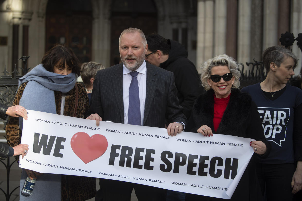 Former police officer Harry Miller with supporters outside the High Court, London, ahead of the ruling that his allegedly "transphobic" tweets were lawful and Humberside Police's response interfered with his right to freedom of expression.