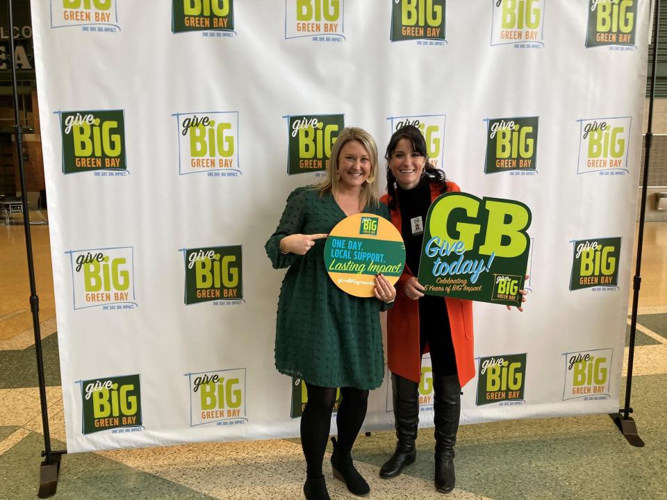 Wello Executive Director Natalie Bomstad, left, and We All Rise Crime Victim Advocate Tanya Londo pose following the Give BIG Green Bay press conference on Tues., Jan. 17, at the Lambeau Field Atrium in Green Bay.