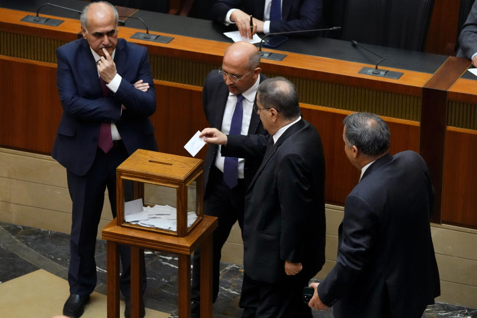 Lebanese lawmaker Michel Moussa casts his vote as parliament gathers to elect a president at the parliament building in downtown Beirut to elect a president at the parliament building in Beirut, Lebanon, Wednesday, June 14, 2023. Lawmakers convened Wednesday in another attempt to elect a president and break a seven-month power vacuum that has roiled the tiny Mediterranean country. (AP Photo/Hassan Ammar)